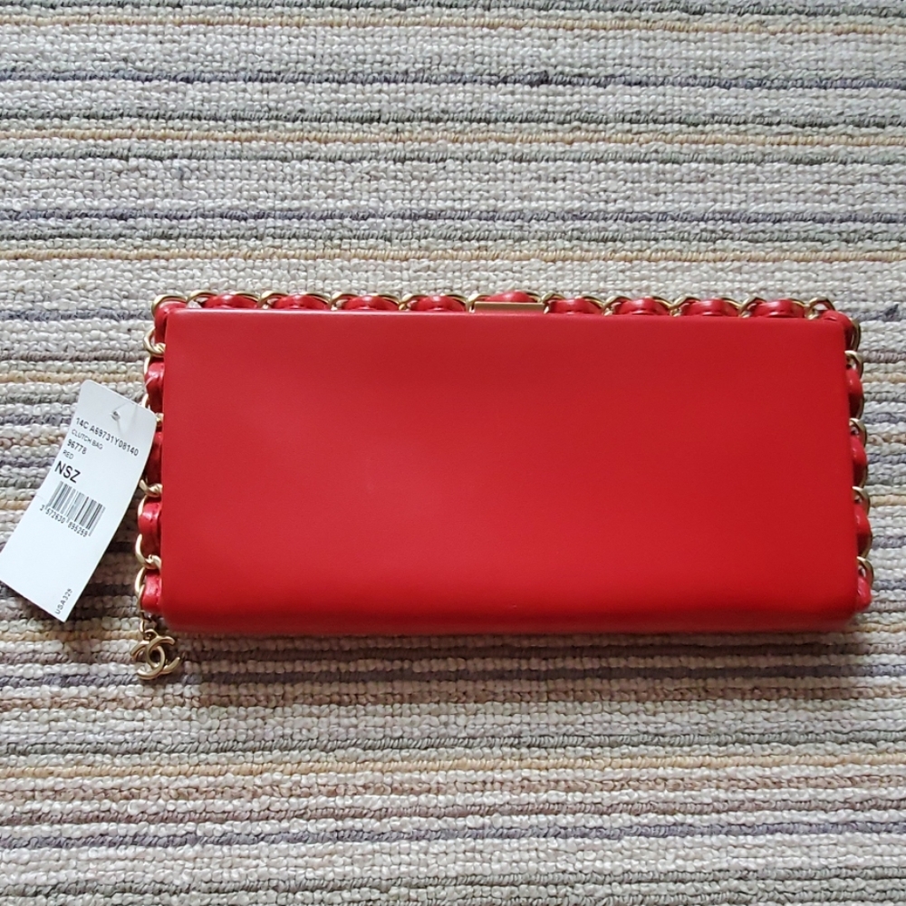 Red and gold detailing Chanel clutch